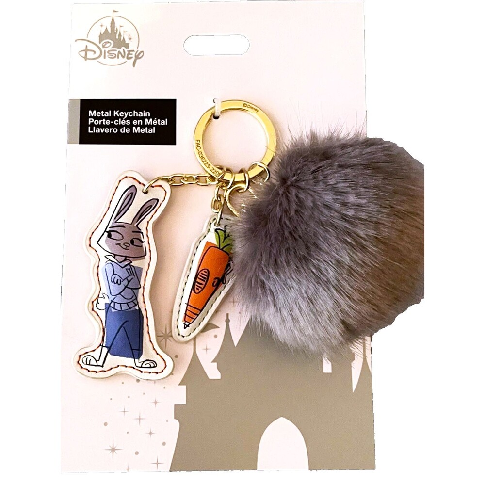 Disney Parks Zootopia Judy Hopps Goldtone Keychain Grey pom pom Bunny Tail